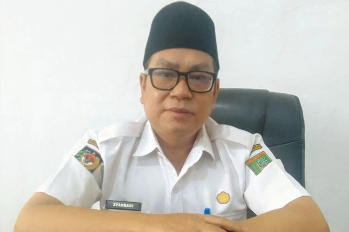 kepala-dinas-sosial-kabupaten-barsel-syahdani